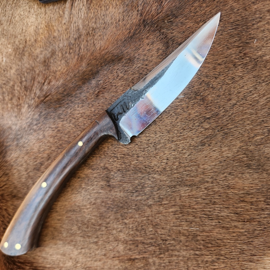 Handcrafted knife with brown handle