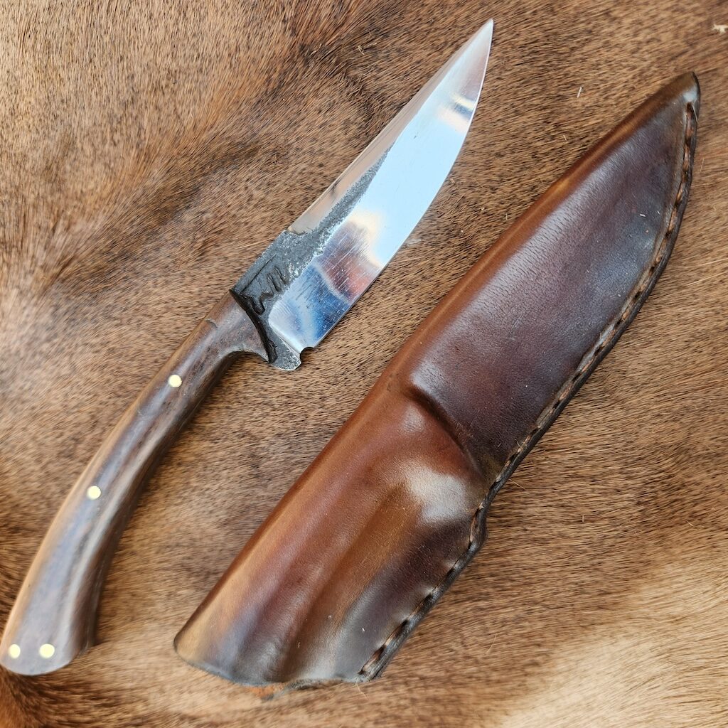 Handcrafted knife and leather knife sleeve